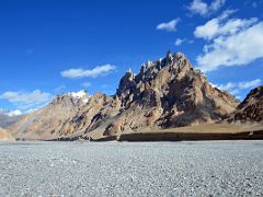 04 Looking At The Eroded Hills After The Exit From the Aghil Pass In Shaksgam Valley On Trek To Gasherbrum North Base Camp In China.jpg